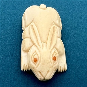 Extra large natural material button of realistic rabbit.