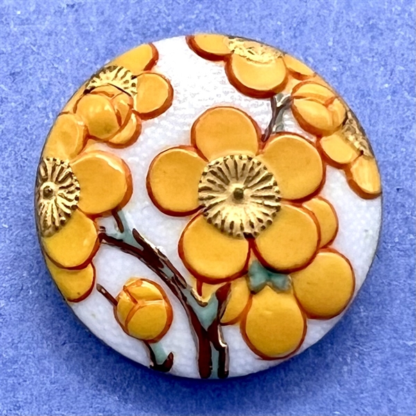 Porcelain Arita button of lovely yellow flowers.