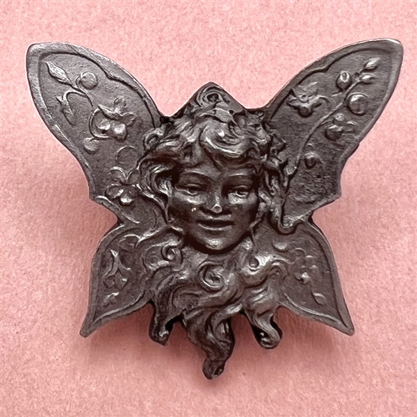 Battersea pewter “fairy girl” Art Nouveau style button.