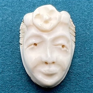 HIGHLY COLLECTIBLE Motiwala button of a woman’s head.