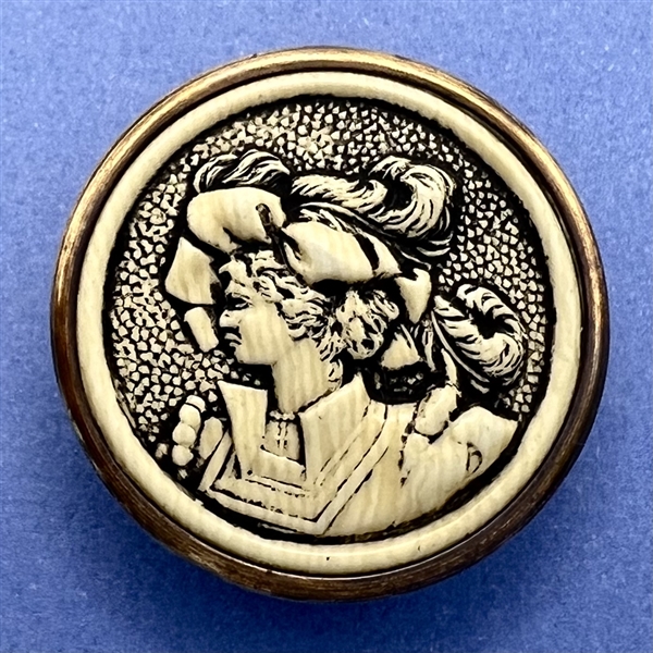 Young man in feathered hat button.