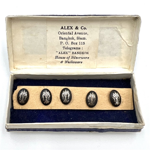 Boxed set of five Niello silver buttons.