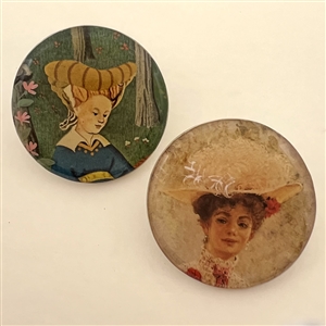 Two studio buttons by Shirley Burgess.