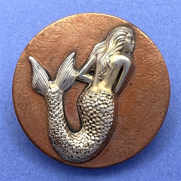 Kevin Kinne mermaid studio button.