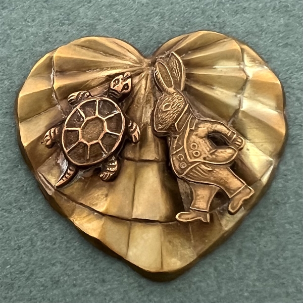 Kevin Kinne “Tortoise and the Hare” studio button.