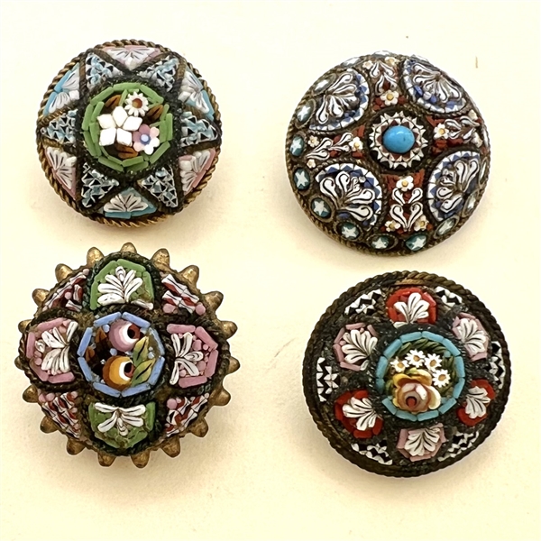 Four Italian mosaic buttons in assorted patterns.