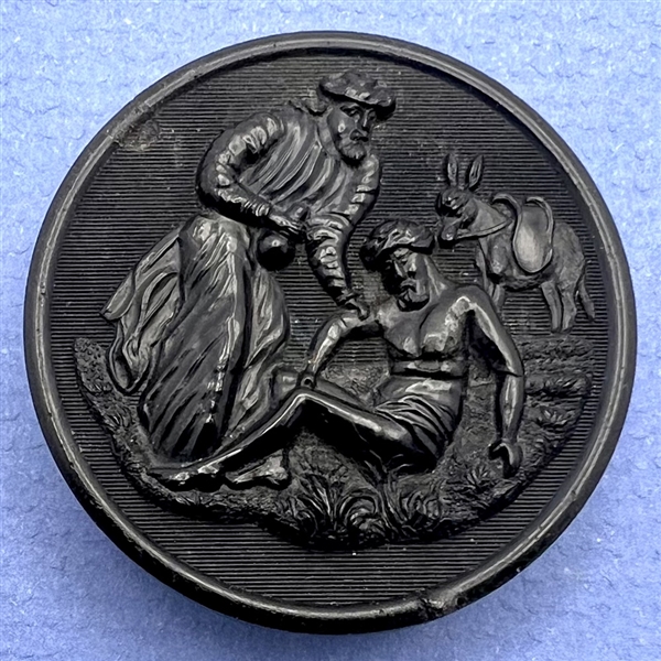 SCARCE Large horn button of “The Good Samaritan.”