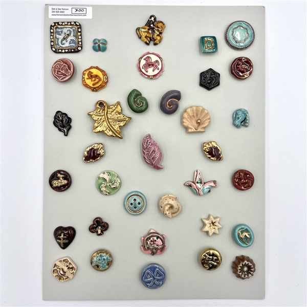 Card of thirty five ceramic buttons.