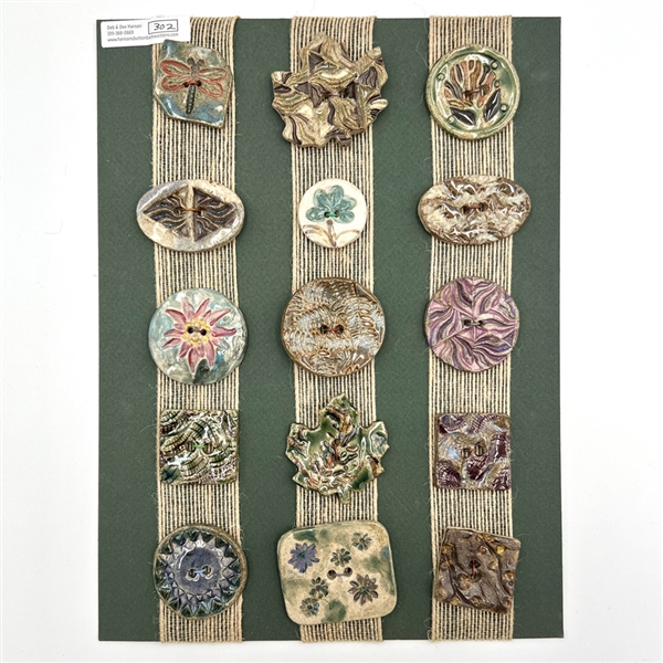 Card of fifteen Vermont Pottery buttons.