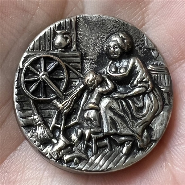 “Bedtime Story” Silvered brass button.