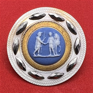 An 18th c. Wedgwood Greek figures set in pearl button.