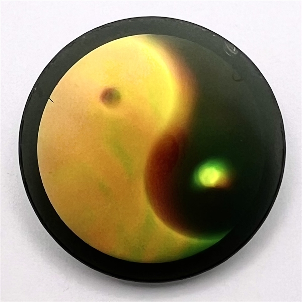 Large holographic button of yin-yang.