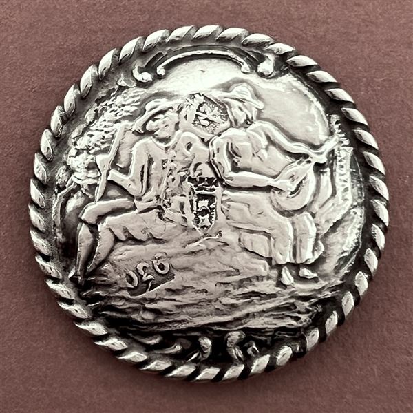 Dutch silver button of man and woman musicians.