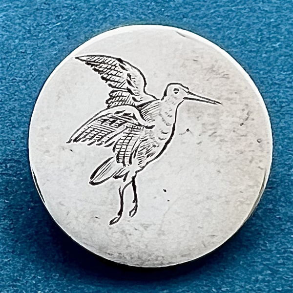 Hallmarked silver sporting button of a bird.