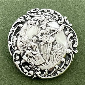 Hallmarked silver button of a courting couple.