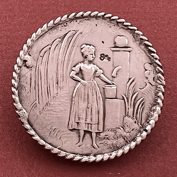 “A Peasant Woman” Continental silver button.