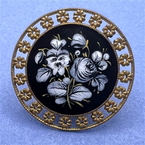 A 19th c. Monochrome enamel button of flowers.