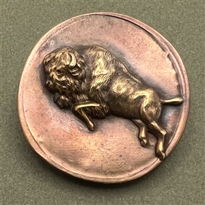 Large handmade copper and brass button of a buffalo.