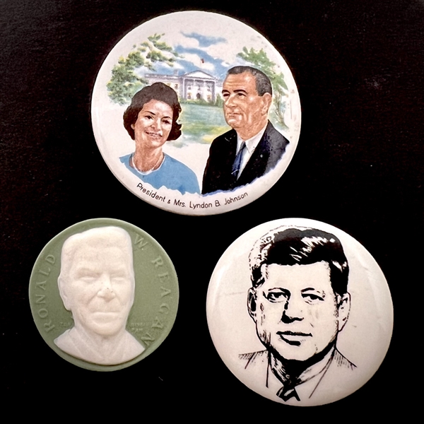 Three assorted ceramic buttons of U.S. presidents.