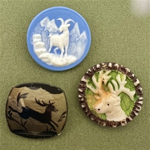 Three assorted buttons  - deer and a goat.