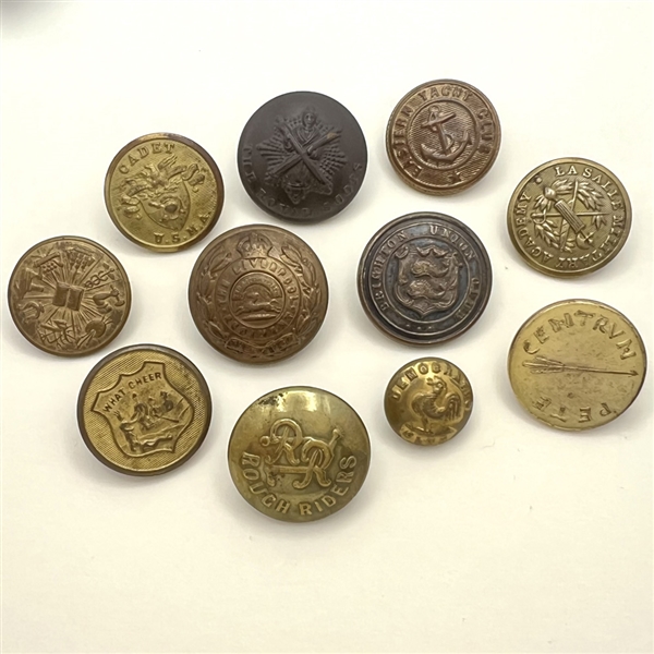 Eleven of assorted foreign and U.S. Uniform buttons.