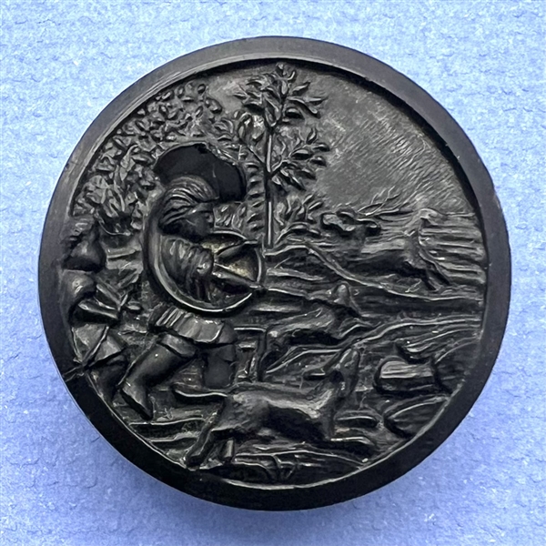 French pewter button of an owl with verbal.