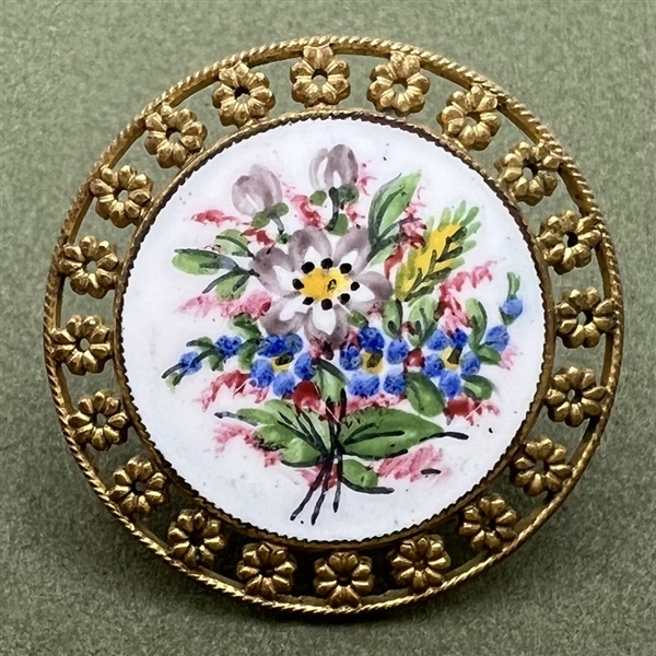 A 19th c. Enamel button of bouquet of wild flowers.