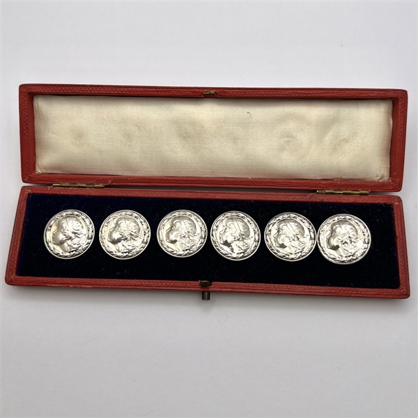 Boxed set of six hallmarked silver buttons of a profile of young girl’s head.