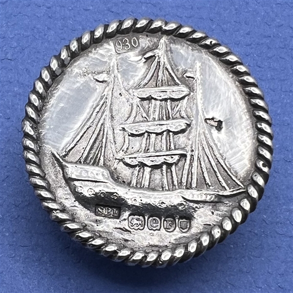 Hallmarked silver button of a clipper ship.