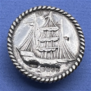 Hallmarked silver button of a clipper ship.