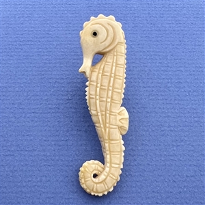 Extra large seahorse Netsuke style natural material button.