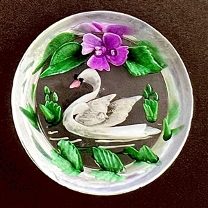 Reverse carved acrylic button of swimming swan.