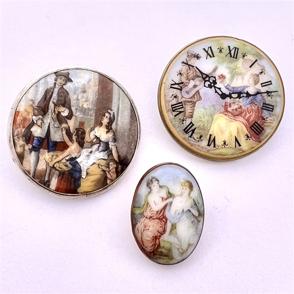 Three studio porcelain buttons by Phil Linley.