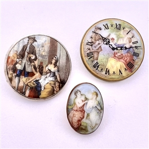 Three studio porcelain buttons by Phil Linley.