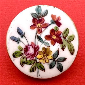 Porcelain button with floral design.