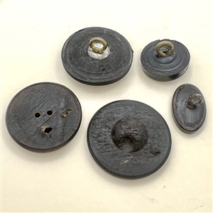 Five molded horn buttons.