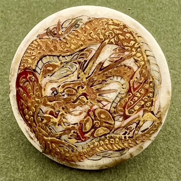 Japanese Satsuma button of gold and red dragon.