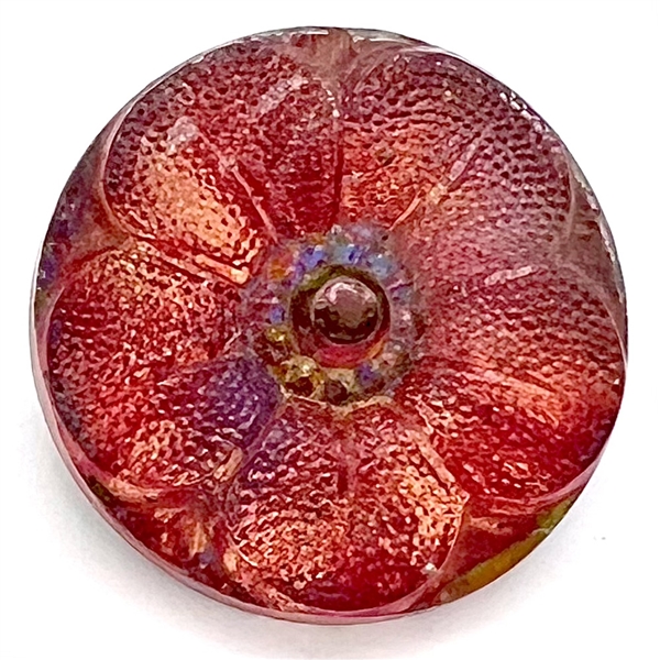 Lacy-type glass button of a flower.