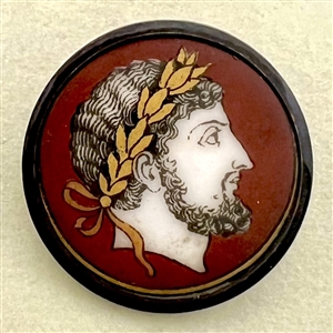 Liverpool transfer porcelain button on dark red of a man.