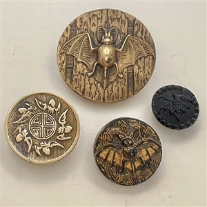 Four fabulous bat buttons.