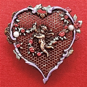 Delicate 19th c. heart shaped enameled screen back button with a cherub.