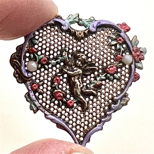 Delicate 19th c. heart shaped enameled screen back button with a cherub.