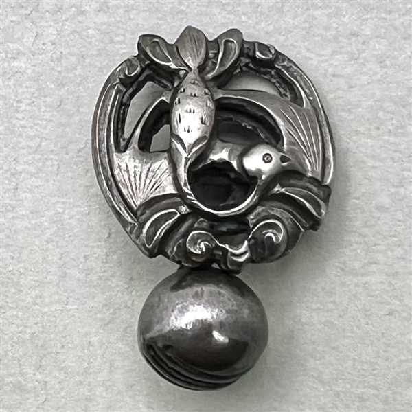 Asian silver toggle button.