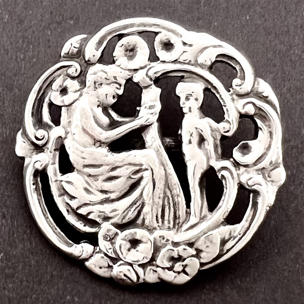 Silver button of “Cupid and Venus."