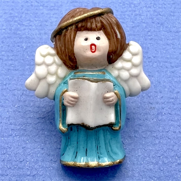 Realistic singing angel Jasperware studio button by Stella Rzanski. 