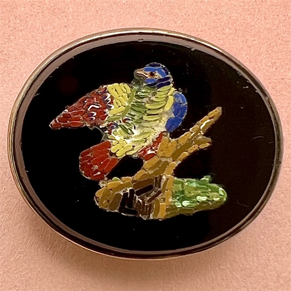 Fantastic oval Italian micro mosaic button of a colorful bird on a branch.