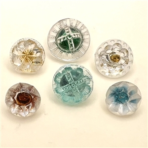 Six glass radiant buttons. 