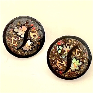 Two exquisite watch crystal buttons. 