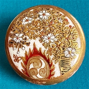 Large Satsuma button depicting large decorated drum used with bugaku dance performances.