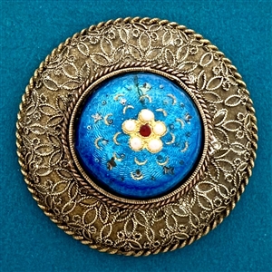 A 19th c. Basse-taille enamel button of a flower.